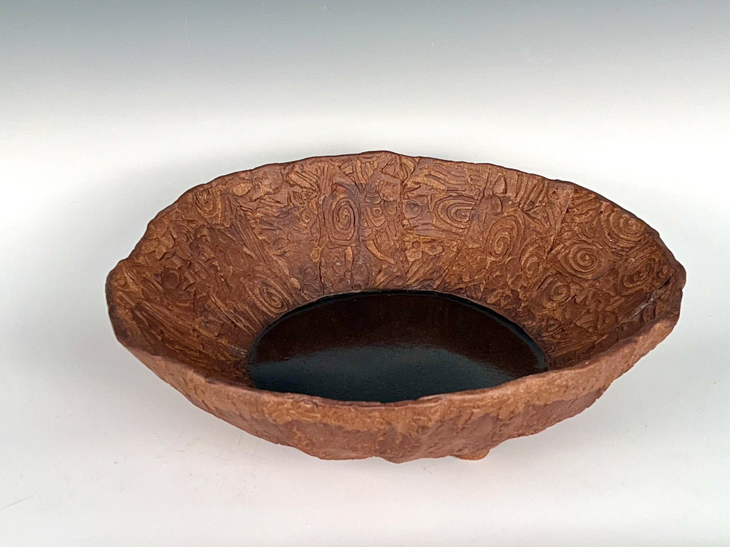 Embossed Bowl: Embossed, stained & glazed high fired stoneware on 3 legs (Contact Chemers Gallery)