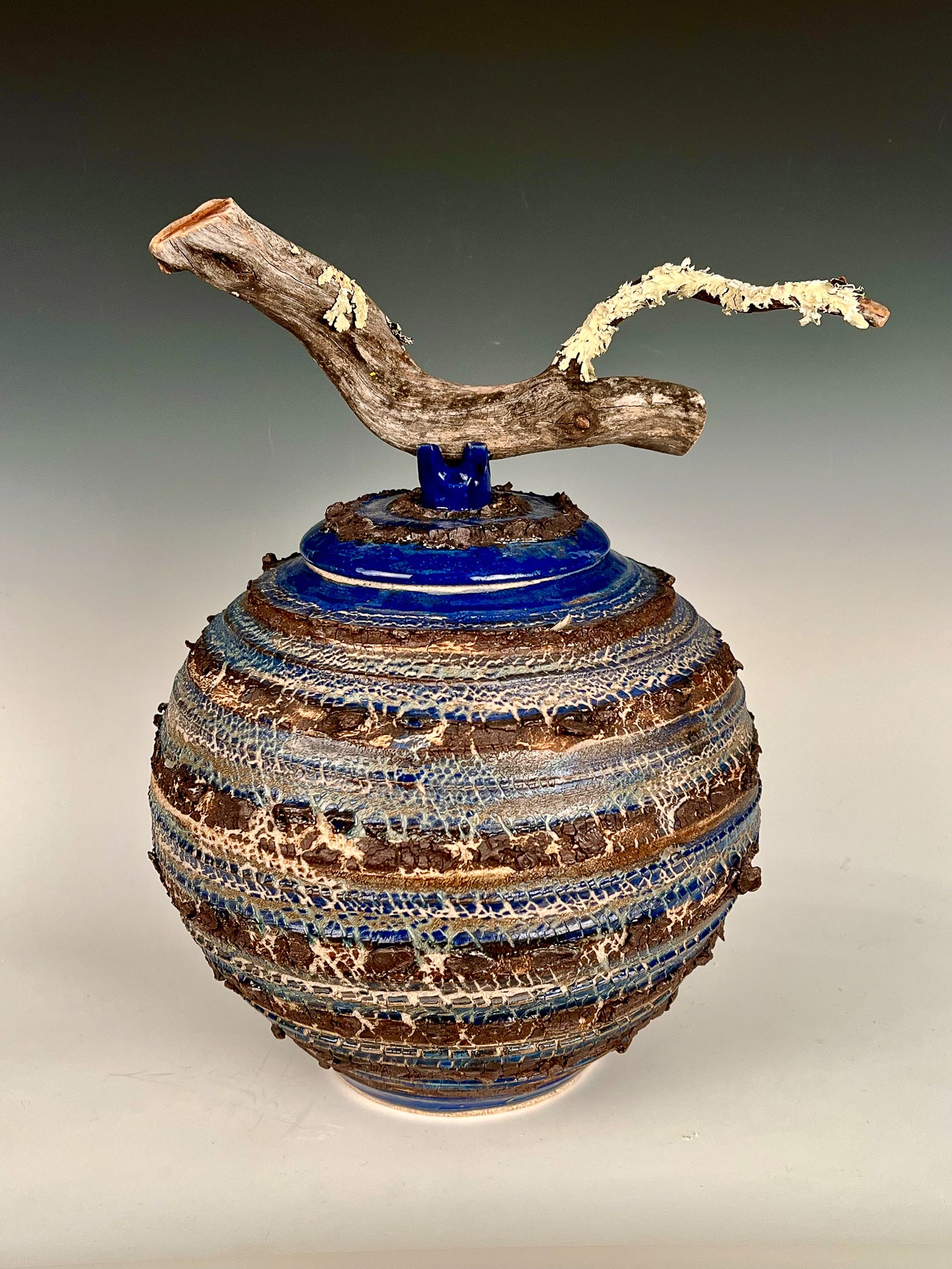 Brown n’ Blue Urn: Glazed, textured & stained high fired porcelain w/ Black Mountain slip & manzanita handle