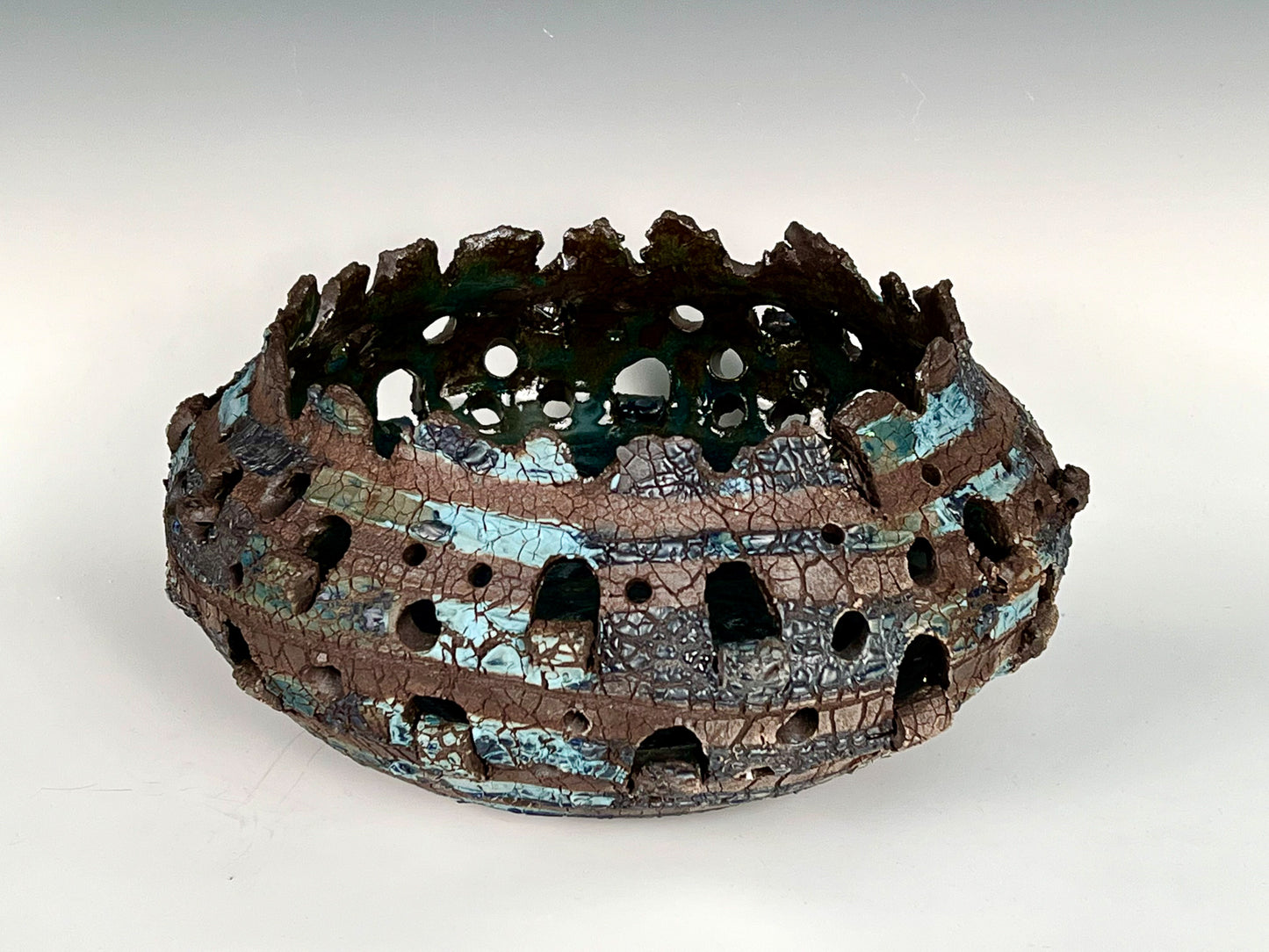 Dragon's Egg: Stained, textured & altered high fired stoneware w/ glazed porcelain slip (Contact Chemers Gallery)